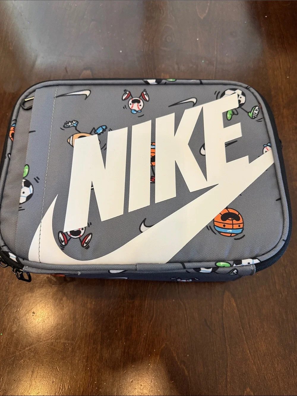 Nike Gray Sports Graphic Logo Lunch Pale with White Swoosh